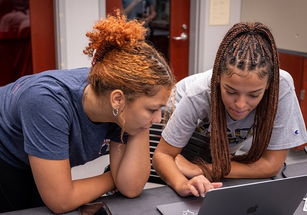 Students Together with Laptop